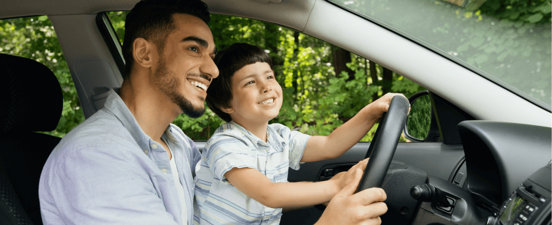 father and son drive car